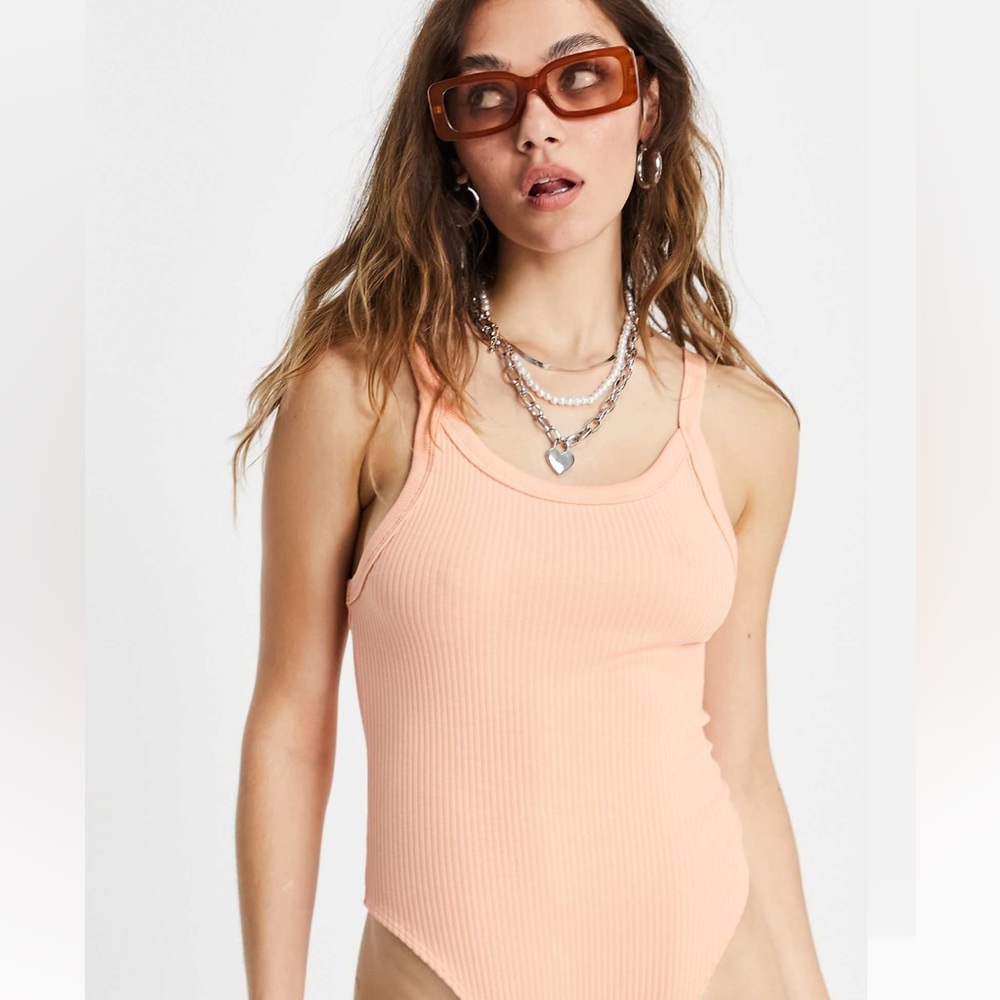 Weekday Kristen organic cotton ribbed bodysuit in peach size s
